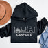 Introducing the ultimate companion for your outdoor adventures: the Camp Life Hoodie. Designed for those who find solace under the stars and joy by the campfire, this hoodie encapsulates the essence of camping. Featuring a picturesque camping scene that speaks directly to the heart of outdoor enthusiasts